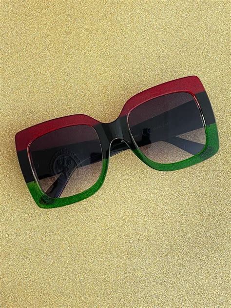 70s oversized square glasses.